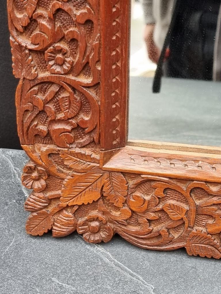 A Thai carved hardwood framed wall mirror, 42 x 50cm. - Image 3 of 3