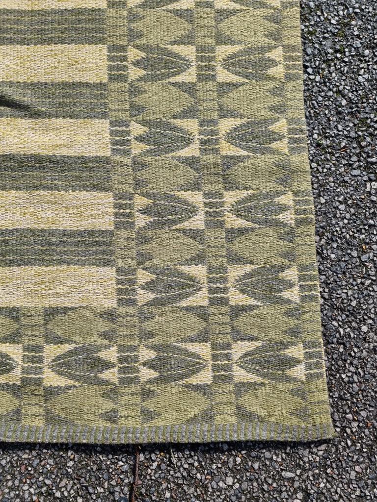 A Swedish double sided rug, 203 x 132cm. - Bild 2 aus 3