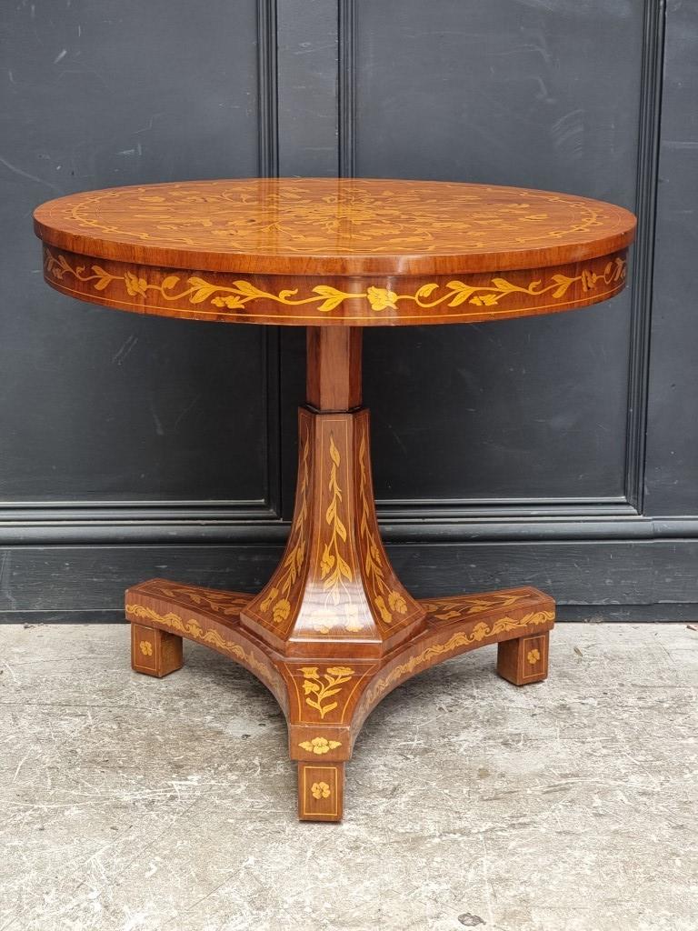 A Dutch walnut and marquetry circular pedestal table, 79.5cm diameter.