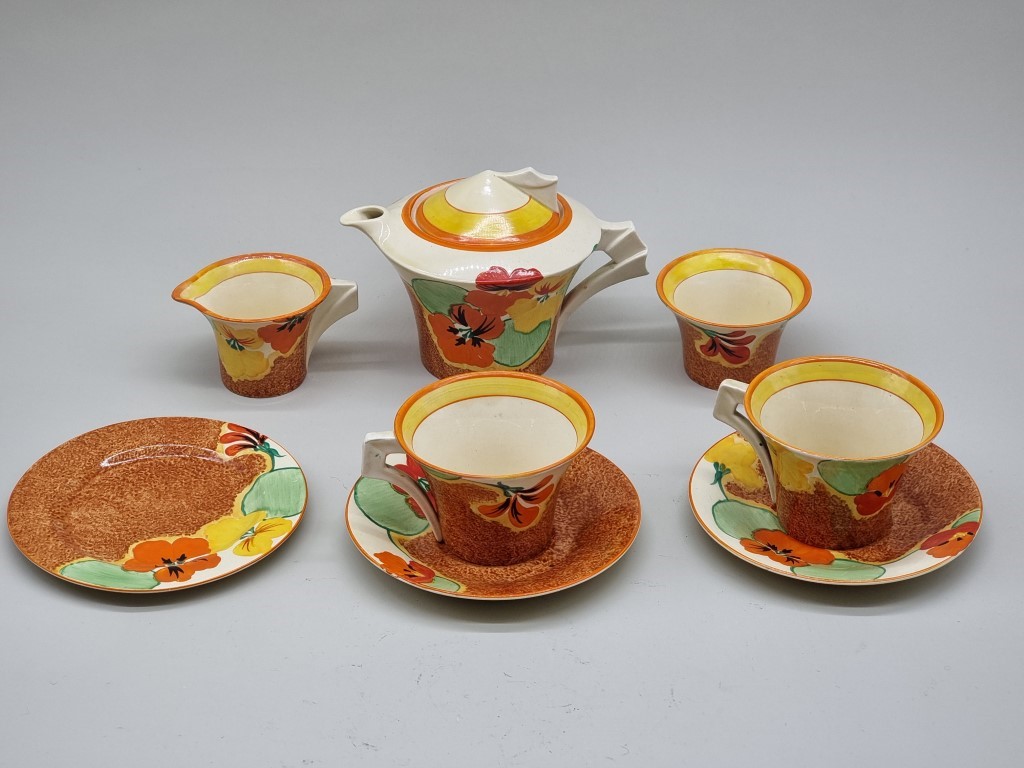 A Clarice Cliff 'Nasturtium' pattern Daffodil shape tea for two set, the teapot & cover 12cm high. - Image 2 of 3