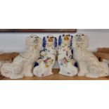 Three pairs of Staffordshire style dogs, largest 31cm high.