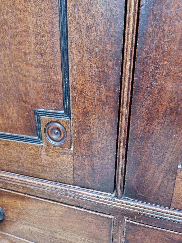 A George IV mahogany linen press, labelled 'R Snowdon, Cabinet Maker & Appraiser, Northallerton', - Image 5 of 7