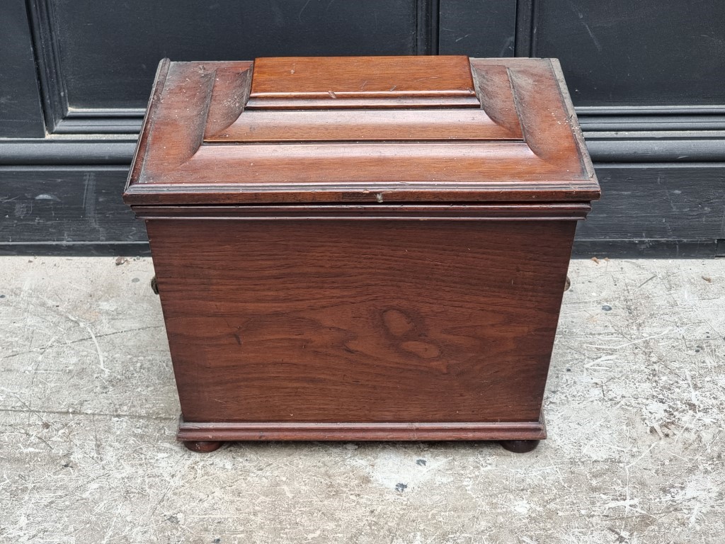 A small antique mahogany cellarette, 46cm wide.