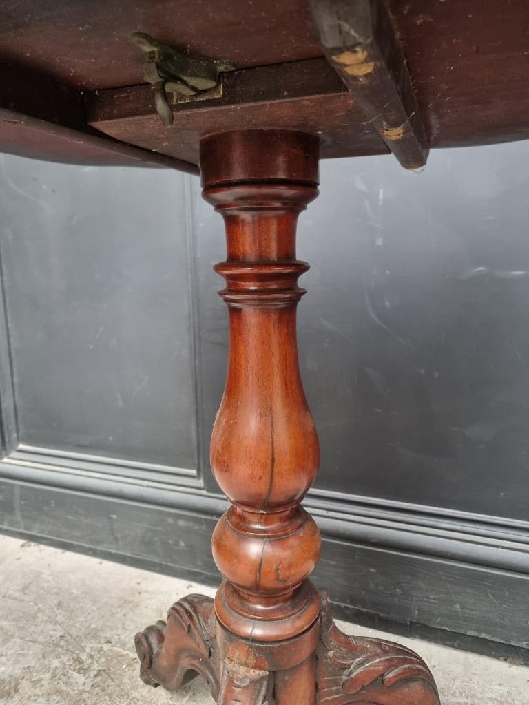 A Victorian mahogany tripod table, with quarter veneered top, 68cm wide. - Image 4 of 4