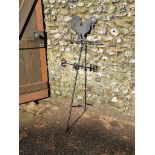 An old black painted metal weather vane, 173cm high.