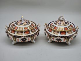 A pair of Royal Crown Derby Imari twin handled tureens and covers, 22cm wide.