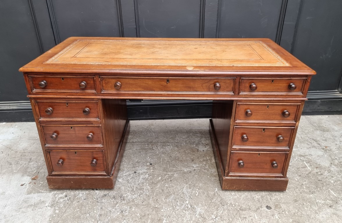 A late Victorian mahogany pedestal desk, 137cm wide.