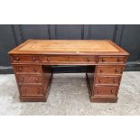 A late Victorian mahogany pedestal desk, 137cm wide.
