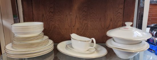 A Royal Doulton 'Gold Concord' pattern part dinner service.
