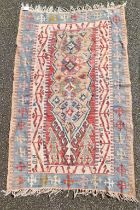 A Kelim flatweave rug, 194cm x 116cm.