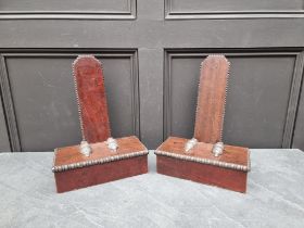 A pair of mahogany and ebonized plate stands, 37cm high.