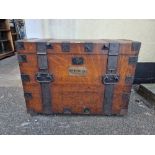 A large late Victorian oak and metal bound silver strong box, bearing brass plaque inscribed 'W.H.