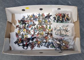 Vintage Lead: a collection of figures, including native Americans and cowboys, some mounted, with