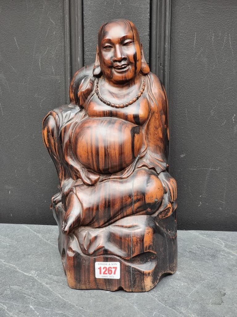 A Balinese carved hardwood Buddha, 32.5cm high.