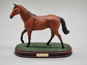 A Royal Doulton figure of Red Rum.