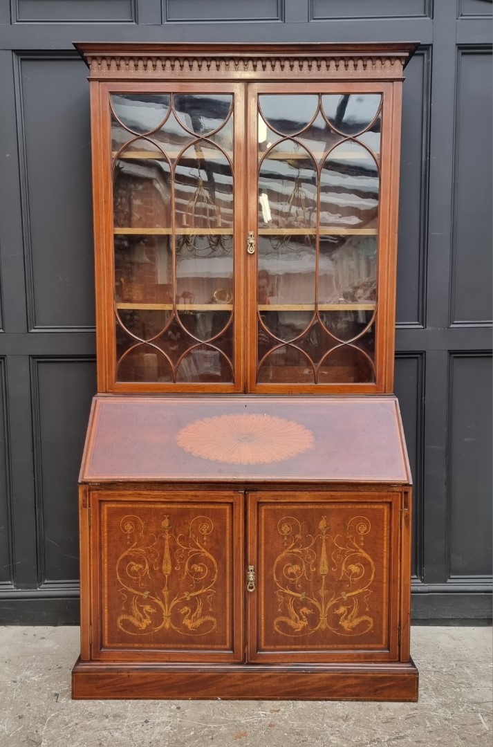 A good late Victorian mahogany and inlaid bureau bookcase, in the manner of Edwards & Roberts, 124cm