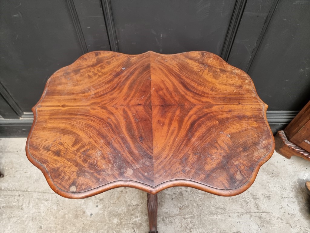 A Victorian mahogany tripod table, with quarter veneered top, 68cm wide. - Image 2 of 4