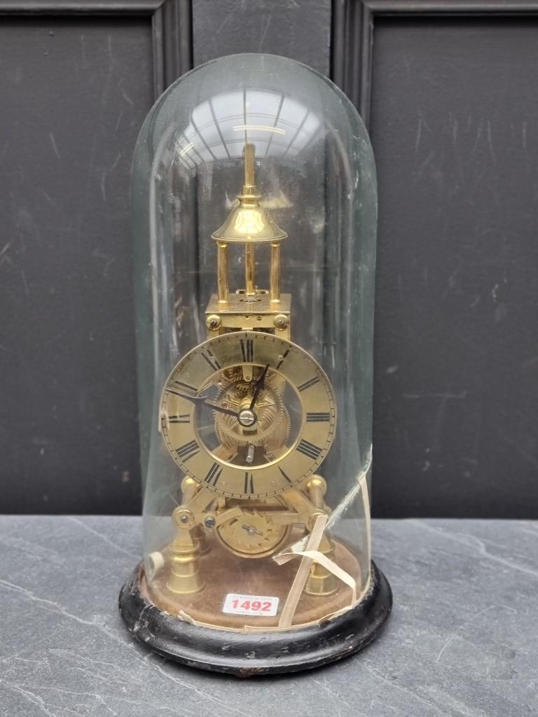 A Victorian brass skeleton fusee timepiece, with pendulum, total height 34.5cm, (glass dome