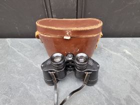 A pair of Ross Stepruva 9x35 binoculars, in case.