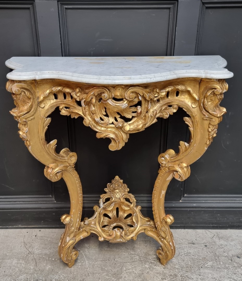 A 19th century, Louis XV style, carved giltwood and marble top console table, 97cm high x 96.5cm