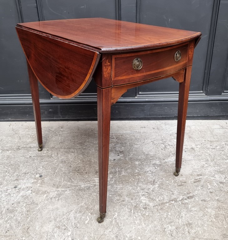 A George III mahogany and inlaid bowfront Pembroke table, 98cm when open.