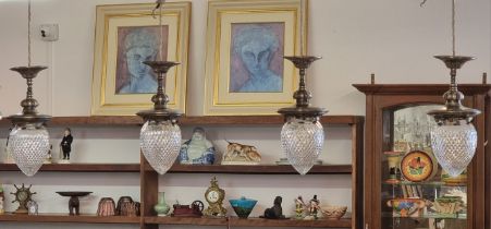 A good set of four Edwardian cut glass and electroplated ceiling pendant lights, each with