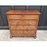 A 19th century Continental figured mahogany chest of drawers, 102cm wide.