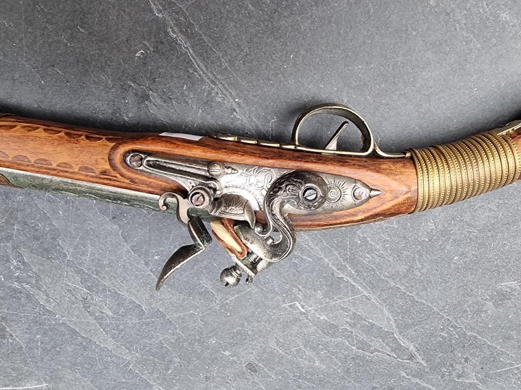 A reproduction flintlock musket; together with two similar pistols. (3) - Image 11 of 14