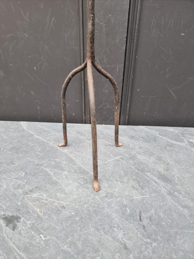 An antique wrought iron tripod candle stick, 85cm high. - Image 2 of 3