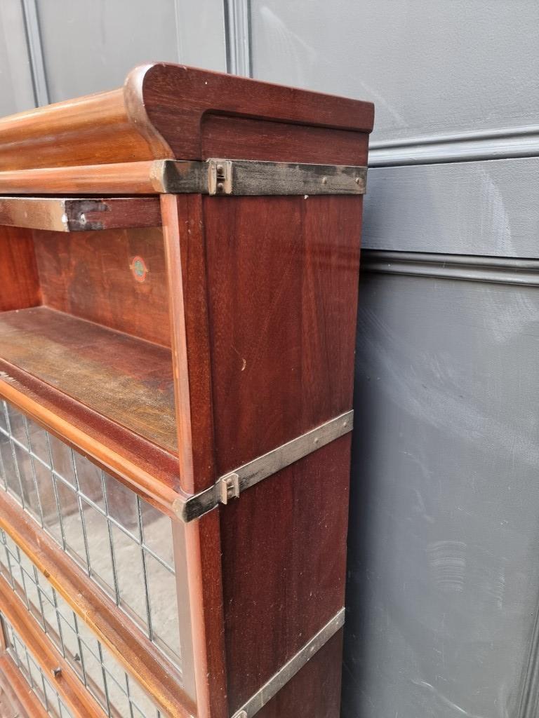 An early 20th century Globe Wernicke mahogany four tier sectional bookcase, with leaded glass - Image 5 of 7