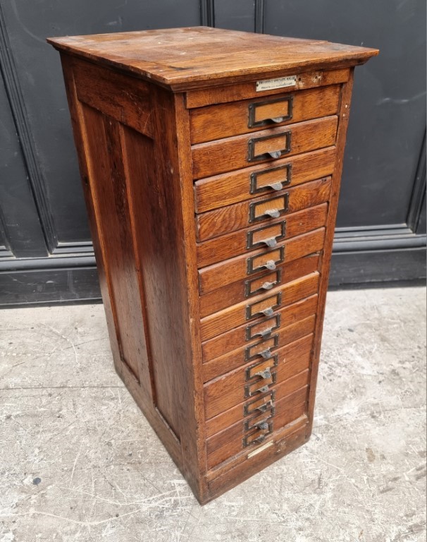 A small 1920s oak filing chest, labelled 'The Office Speciality MFG Co, Toronto...', 79.5cm high x