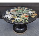 A vintage Piero Fornasetti 'Fiori' circular occasional table, labelled, 60cm diameter.