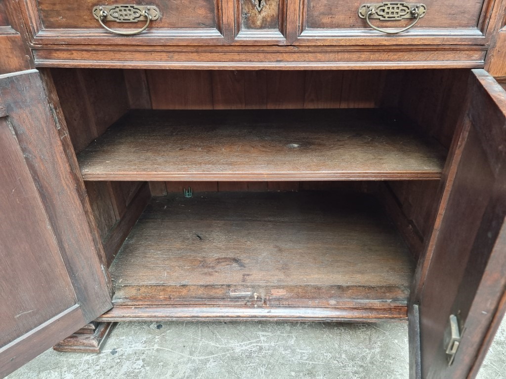 An antique oak panelled side cabinet, 102.5cm wide. - Image 7 of 7