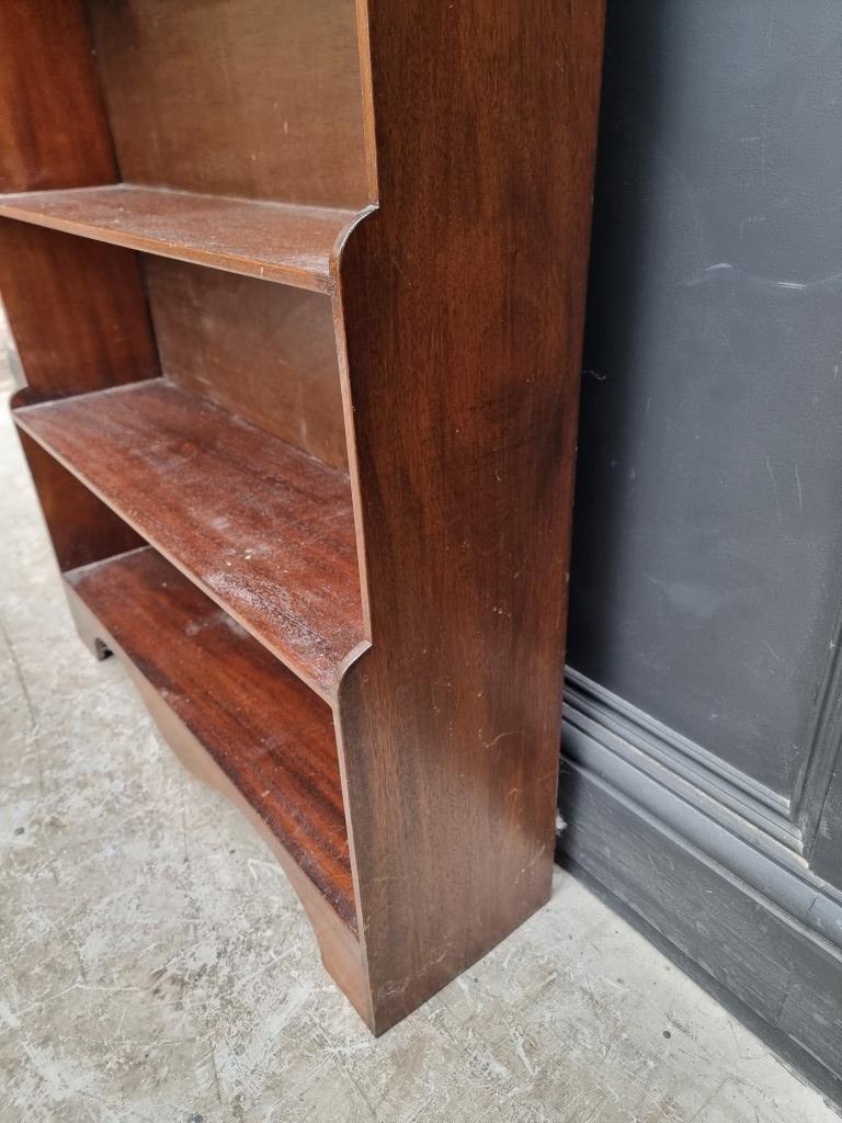 A reproduction mahogany open waterfall bookcase, 78cm wide. - Image 3 of 3