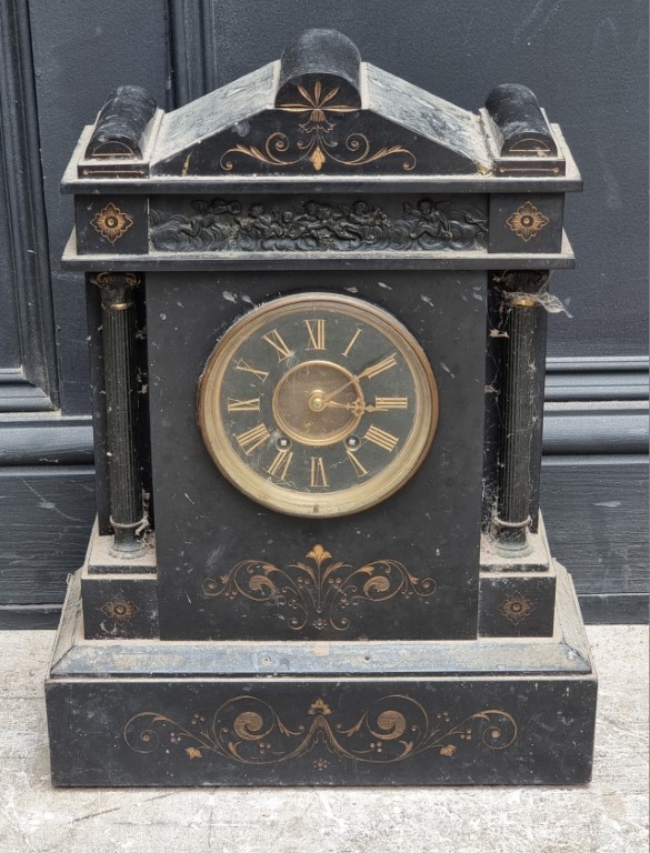 A late 19th century slate mantel clock, 40cm high, (lacking pendulum).