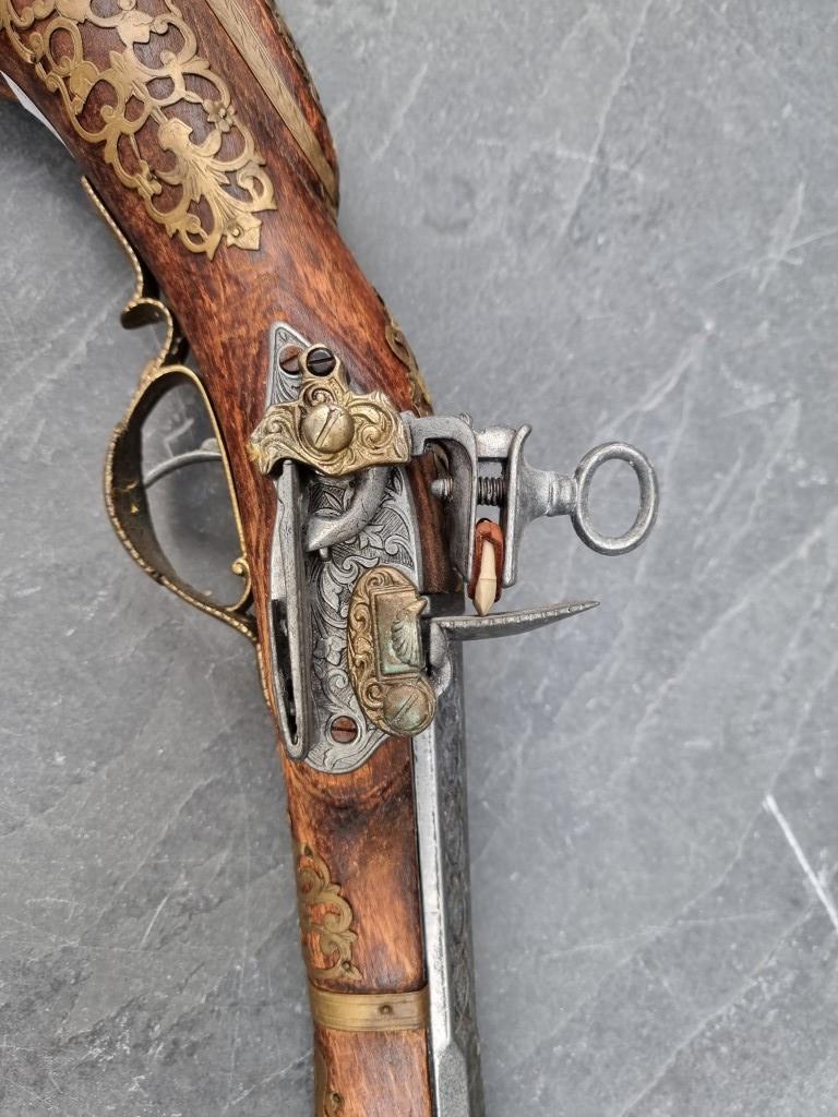 A reproduction flintlock musket; together with two similar pistols. (3) - Image 7 of 14