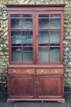 A George III oak and mahogany bookcase, 126.5cm wide; together with another George III chest of