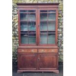 A George III oak and mahogany bookcase, 126.5cm wide; together with another George III chest of