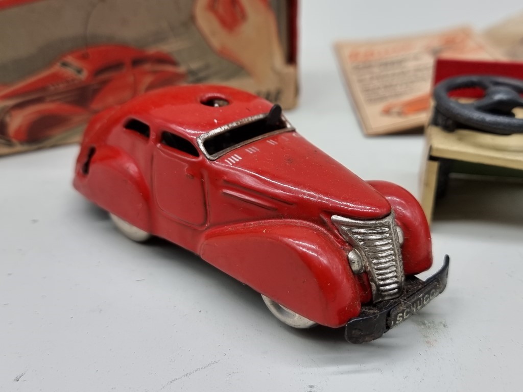 Schuco: a vintage red Schuco Telesteering car 3000, with box, key, instructions and accessories. - Image 3 of 3