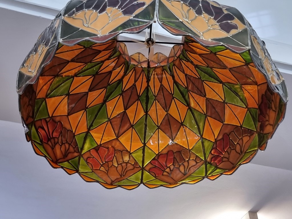 A large Tiffany style lamp shade, 64.5cm wide. - Image 2 of 2