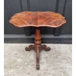 A Victorian mahogany tripod table, with quarter veneered top, 68cm wide.