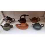 Six Chinese yixing teapots and covers, largest 12cm high. (6)