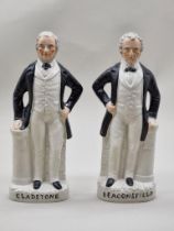 A rare pair of Victorian Staffordshire pottery figures of 'Gladstone' and 'Beaconsfield', 30.5cm
