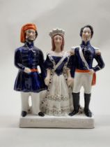 A rare Victorian Staffordshire pottery figure group of 'Turkey England France', 29cm high.