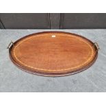 An Edwardian mahogany and inlaid twin handled oval gallery tray, 68cm wide.