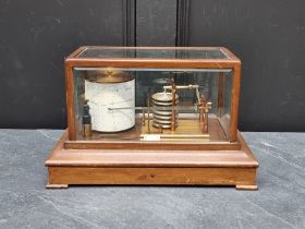 A mahogany barograph, labelled 'T M Taylor & Sons, Cowes', with chart drawer, 37cm wide.