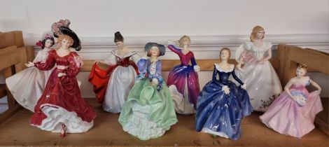 Eight Royal Doulton figures.