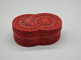 A Chinese cinnabar lacquer box and cover, 17cm wide.
