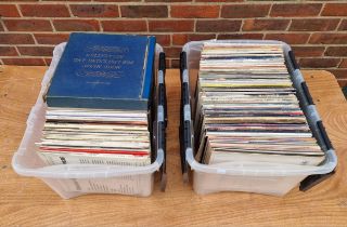 A large collection of 33rpm vinyl records; together with a smaller quantity of 45rpm examples.