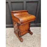 A Victorian figured walnut piano top Davenport, 58cm wide.